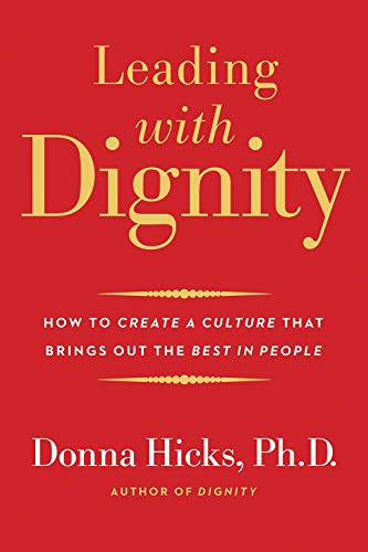 Book cover with red background and gold text titled Leading with Dignity by Donna Hicks.