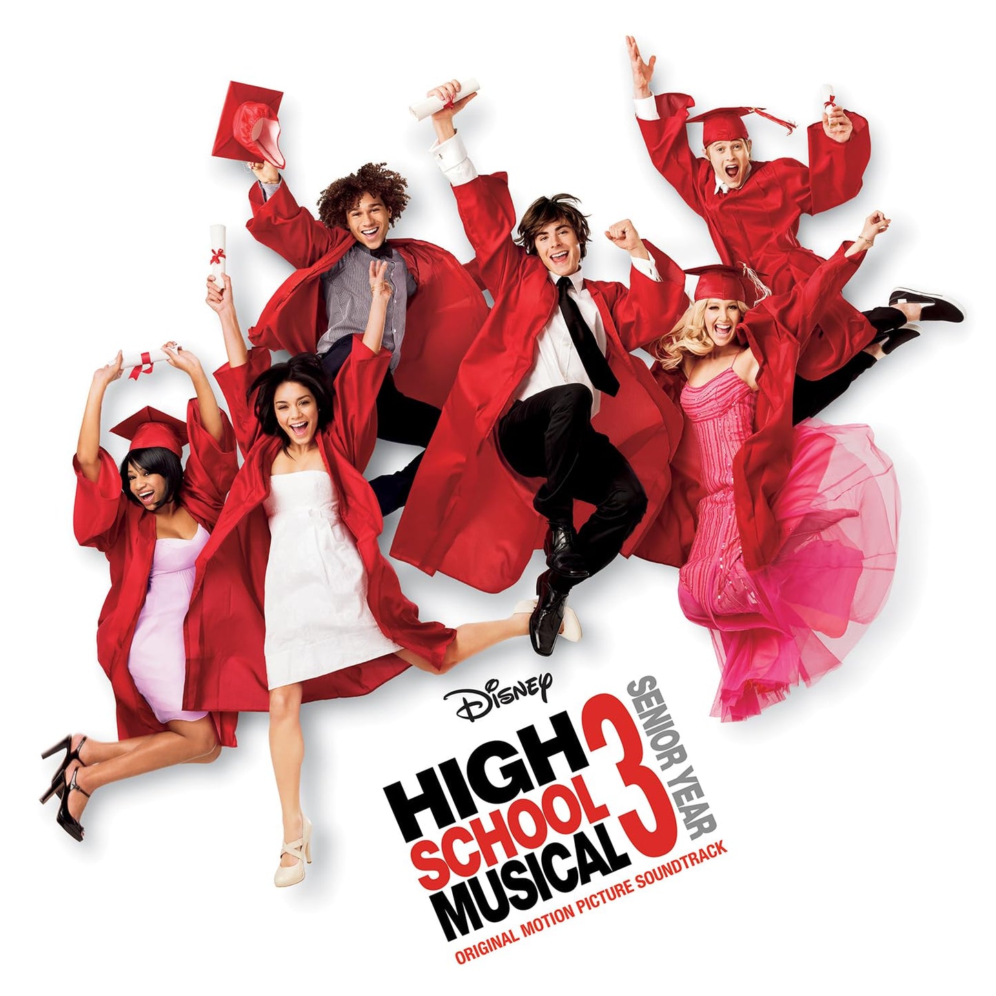 “High School Musical 3” cast in graduation gowns jumping with joy.