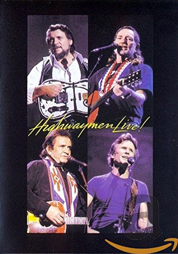 "Four men playing guitars and singing into microphones on a black background."