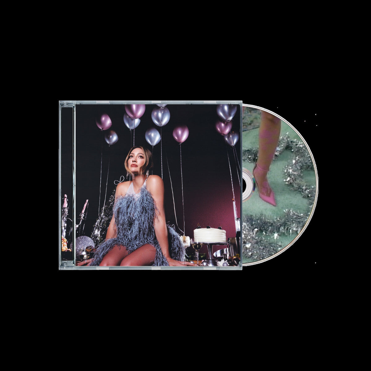 Hilary Duff's "Holiday Things" CD case with a woman and balloons.