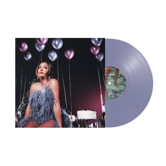Hilary Duff's "Holiday Things" purple vinyl LP record with cover art.