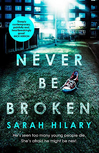 Book cover for Never Be Broken featuring a single red sneaker on dark grass.