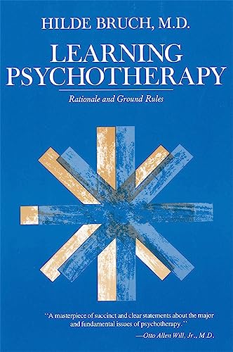 Blue book cover with title "Learning Psychotherapy" and abstract starburst design.