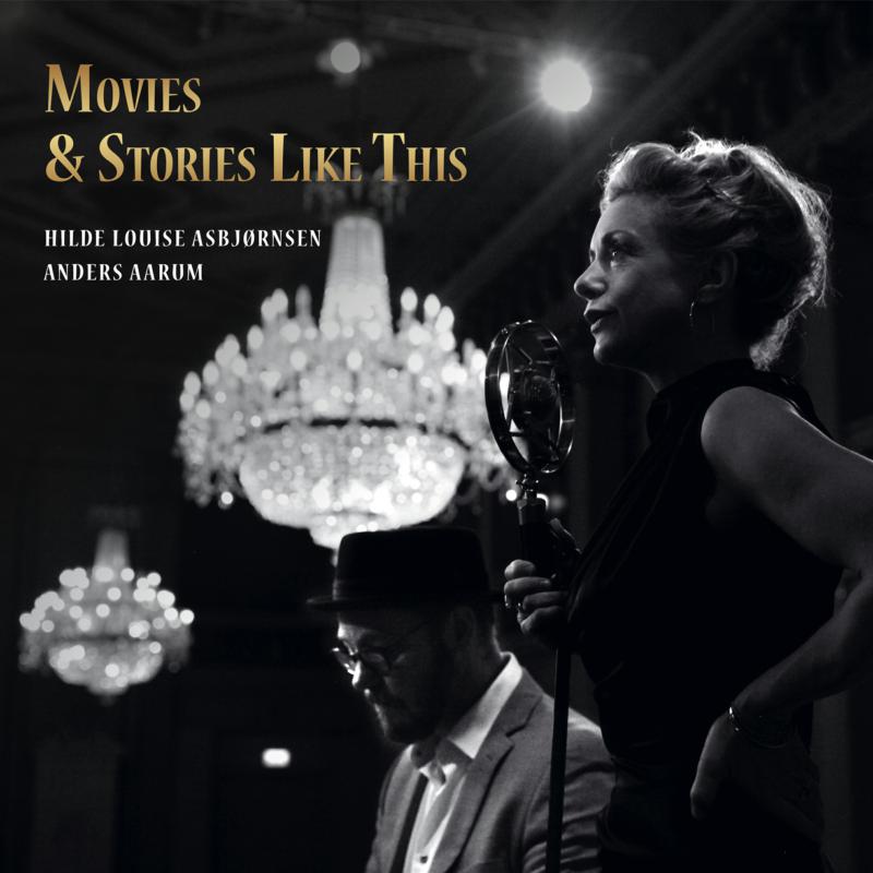 Vinyl album cover featuring a woman singing into a vintage microphone.