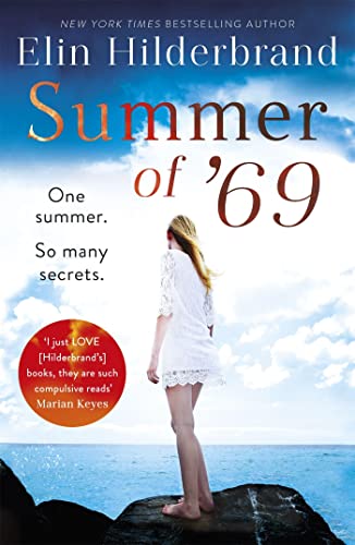 Book cover: woman on rocks overlooking the ocean, titled “Summer of ‘69”.