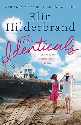 Book cover: two women on a beach with a coastal home backdrop.