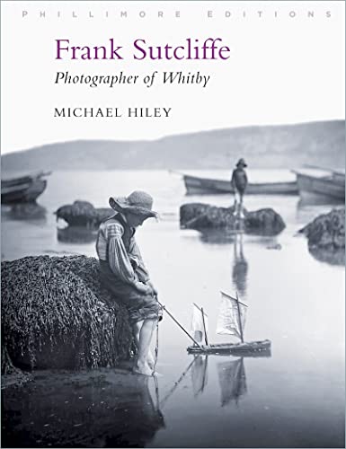 Book cover featuring a vintage photograph of a man and boats in Whitby.