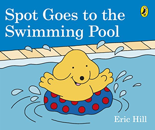 Yellow puppy Spot floats in a blue swimming pool with a red ring.