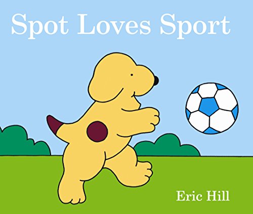 Yellow spotted puppy reaching for a soccer ball on green grass.