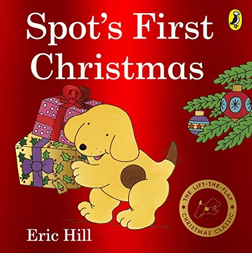 Yellow puppy Spot peeks from behind brightly wrapped Christmas gifts.