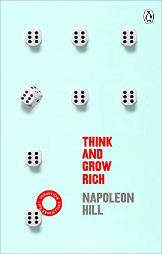 Book cover: "Think And Grow Rich" with scattered white dice.