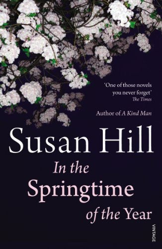 Book cover: white flowers against a dark background, title "In the Springtime of the Year".