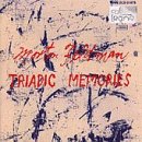 CD cover with abstract black ink splatters on a tan background, featuring red text.