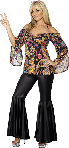 Woman in a floral print off-the-shoulder top and black flared trousers.