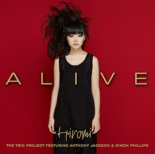 Hiromi album cover, red background, woman with wild hair, and title "ALIVE".