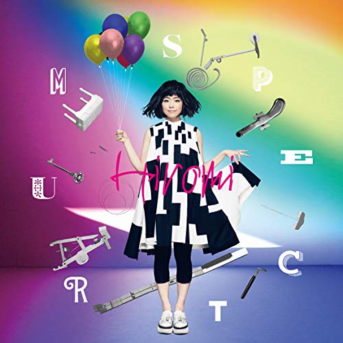 Woman in black and white dress surrounded by floating objects and rainbow background.