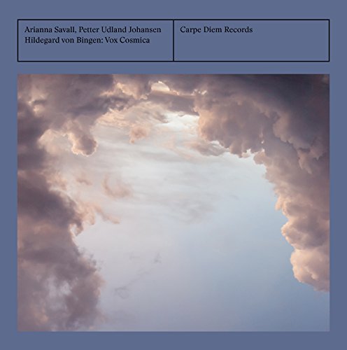 "CD cover with cloudy sky image and blue border, featuring artist and record label names."