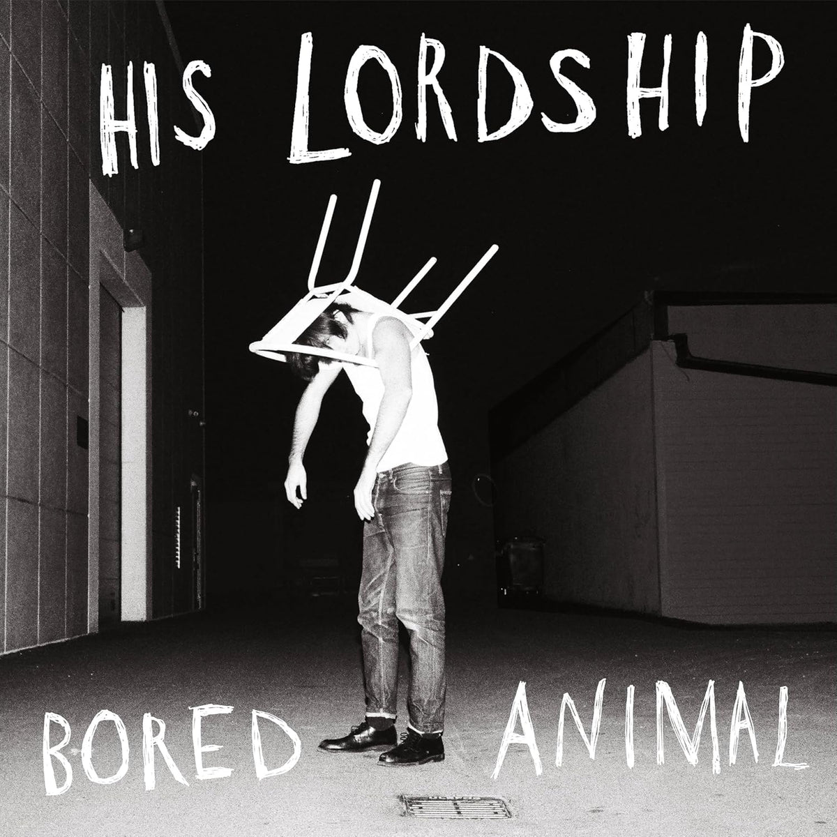 Black and white album cover featuring a person with antlers.