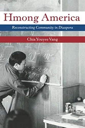 Book cover: "Hmong America" with image of a man writing on a chalkboard.