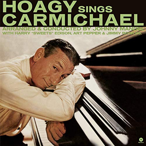 Hoagy Carmichael portrait leaning on a grand piano, album cover.