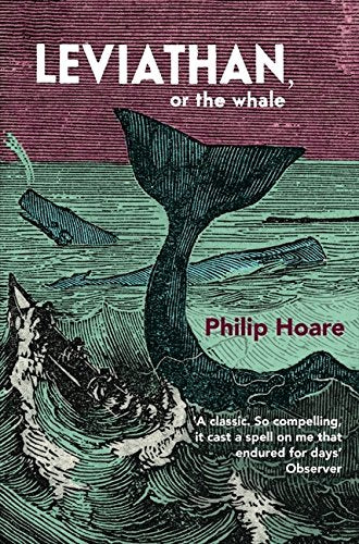 Large book with dark or ominous cover, possibly with a sea monster or whale.