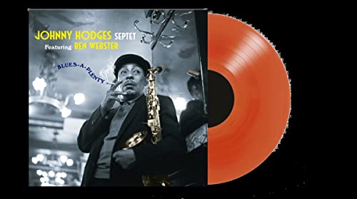 Johnny Hodges album cover and a solid red vinyl record shown.