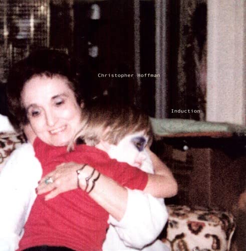Album cover: a vintage photo of a woman embracing a child.