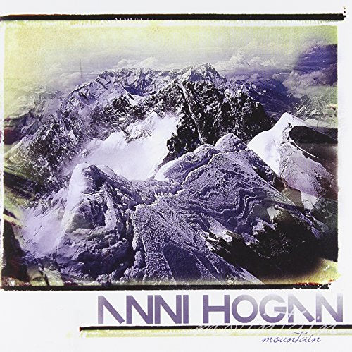 CD cover with a snowy mountain range and artist name "Anni Hogan".