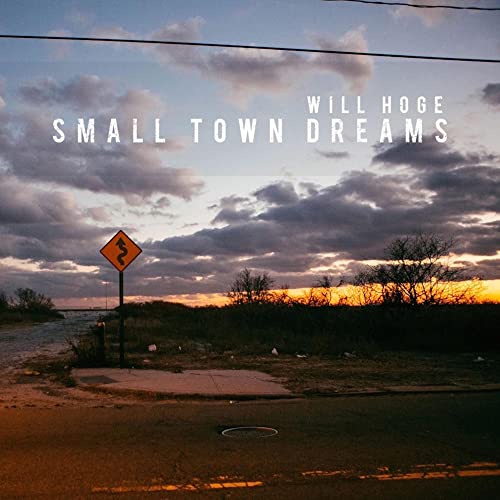 Album cover: winding road sign under cloudy sky at sunset.