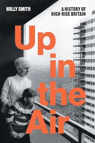 Black and white photo of a woman and child looking out from a balcony.