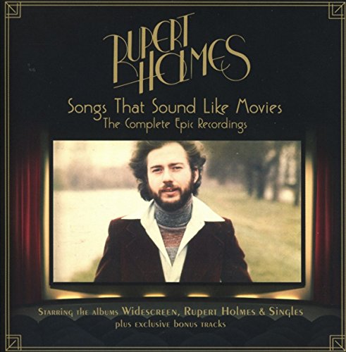 CD cover featuring Rupert Holmes in a cinema screen frame with red stage curtains.