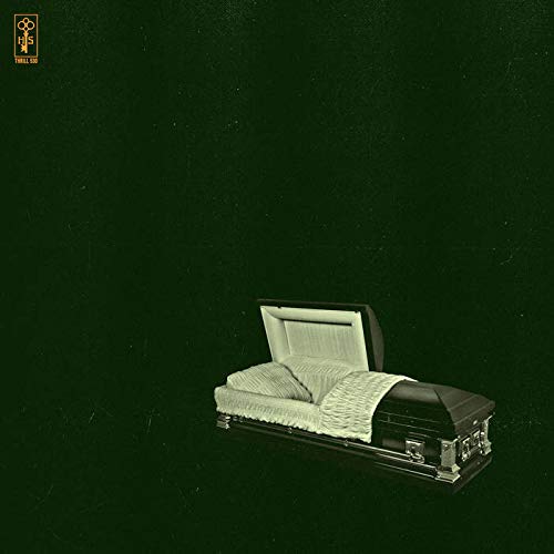 An open coffin on a dark green background with a small gold logo.