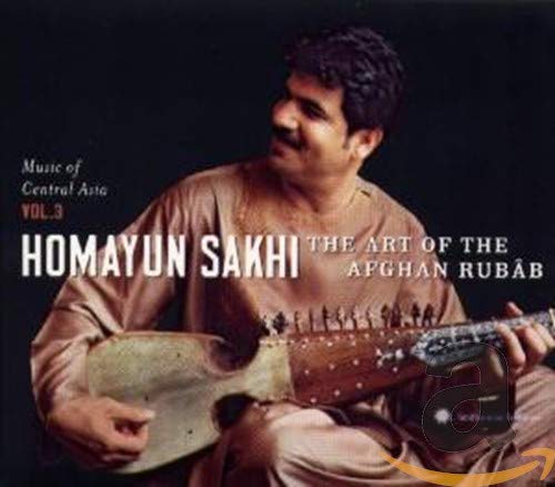 Homayun Sakhi with an Afghan rubâb, a long-necked stringed instrument.