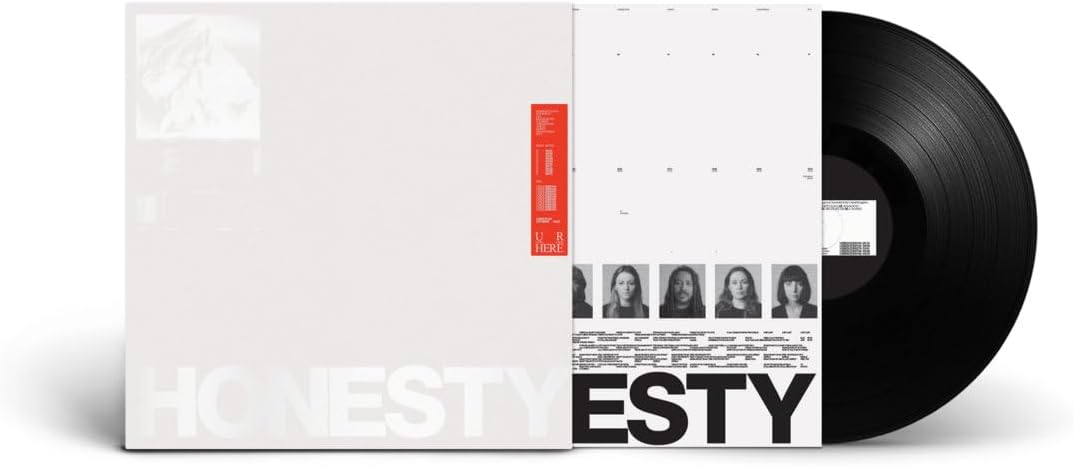 Vinyl record with white album cover featuring faces and text: "Honesty - U R Here".