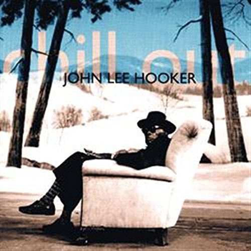 John Lee Hooker album cover: man in hat, seated in chair, snowy trees.