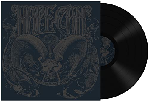Vinyl record with dark, ornate cover art featuring ram skulls and lettering.