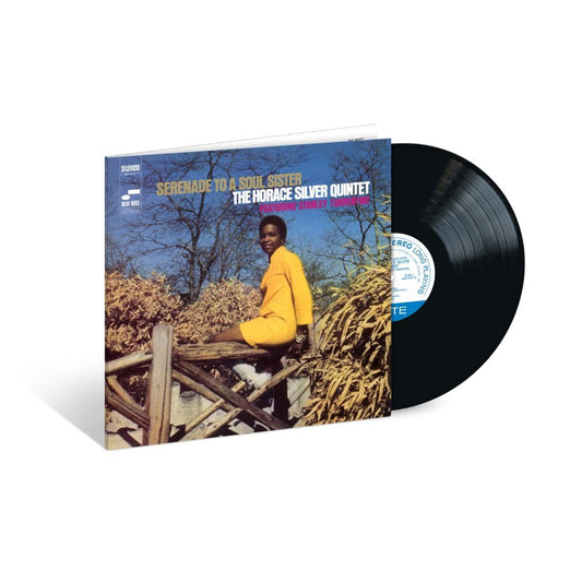 Jazz vinyl record featuring a woman in yellow against a blue sky.