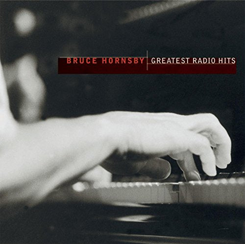 Black and white CD cover of Bruce Hornsby playing piano.