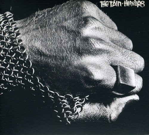 Black and white album cover featuring a close-up of a man’s face.