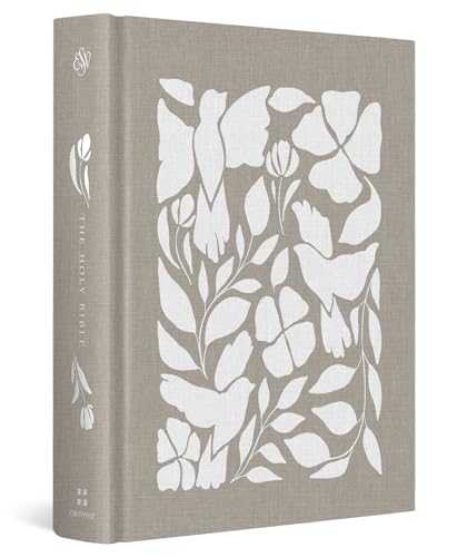 Tan Bible with white floral design on the cover.