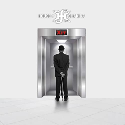 CD cover: man in suit facing an elevator with “Xit” sign.
