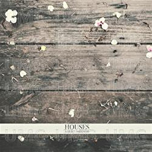 CD cover: weathered wood with scattered white and pink flower petals.