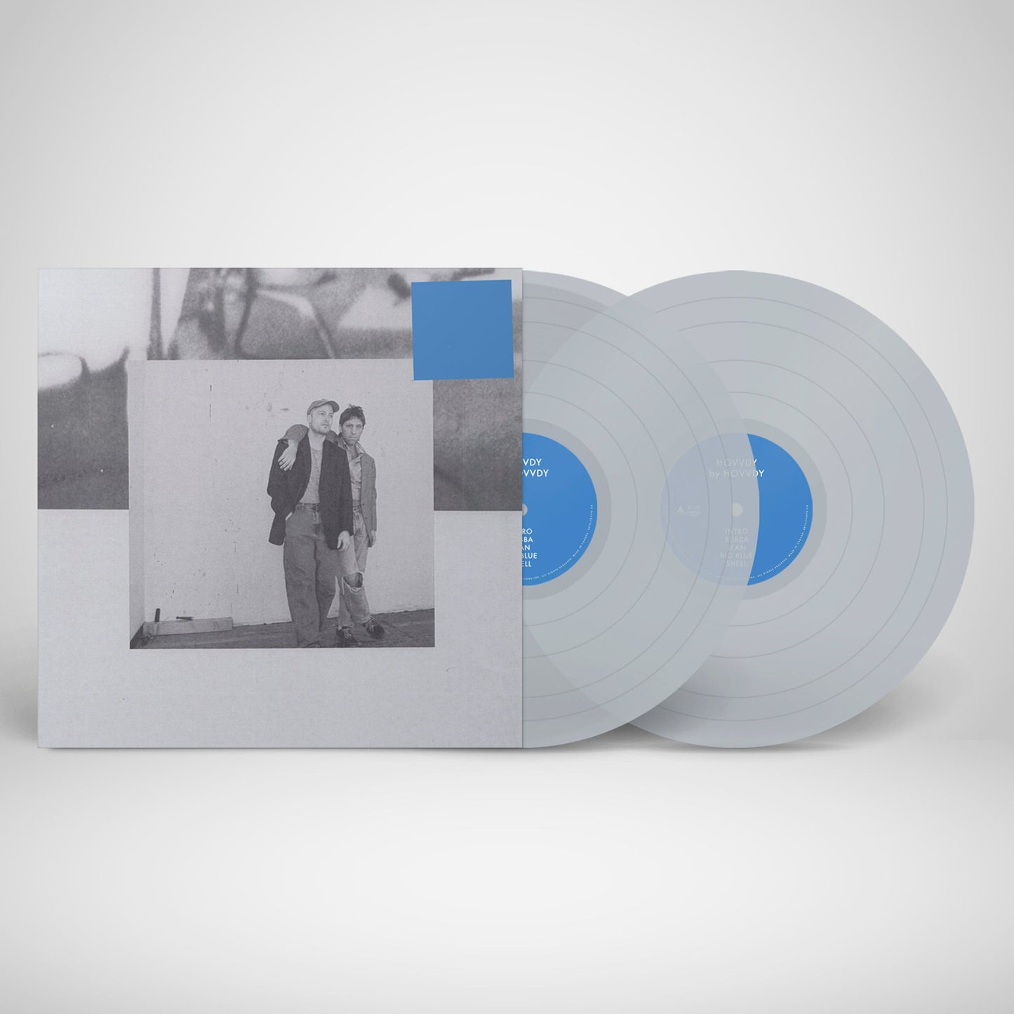 Hovvdy vinyl record sleeve and two translucent discs with blue center labels.