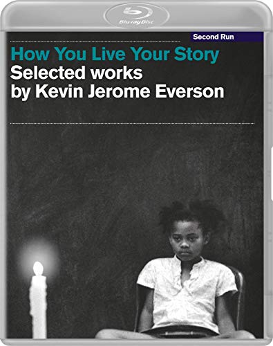 Blu-ray cover featuring a young girl sitting near a lit candle against chalkboard background.