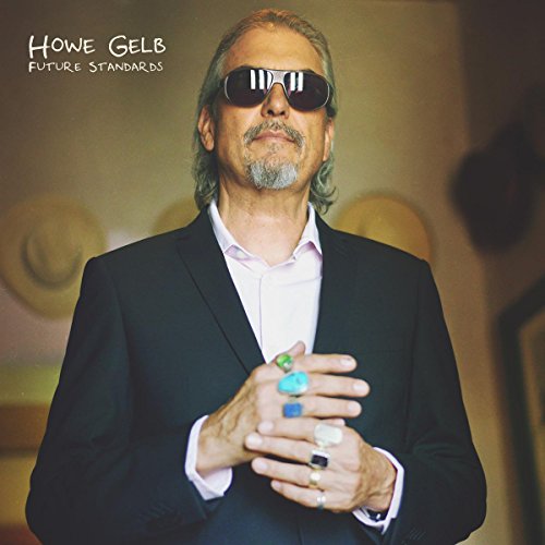 Howe Gelb album cover featuring a man in sunglasses and a suit.