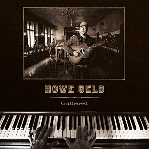 Howe Gelb album cover: musician with guitar in a room, piano keys below.