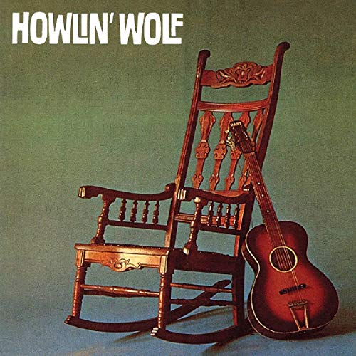 Howlin' Wolf album cover with rocking chair and acoustic guitar.