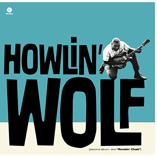 Howlin' Wolf album cover with large text and musician playing guitar.