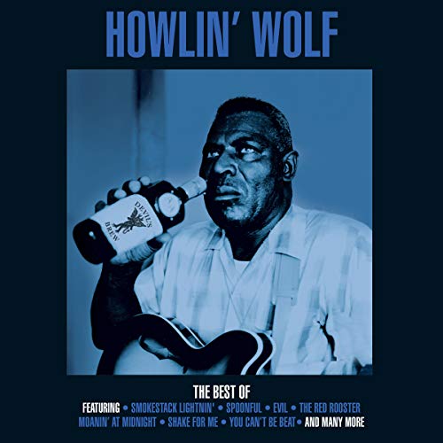 Blue-toned portrait of Howlin' Wolf holding a bottle and guitar on a vinyl cover.