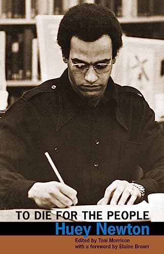 Book cover featuring Huey Newton in a dark uniform, holding a pen.